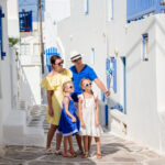 Family having fun outdoors on Mykonos streets